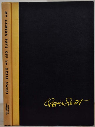 Item #006044 MY CAMERA PAYS OFF. Signed and inscribed by the author. Ozzie Sweet